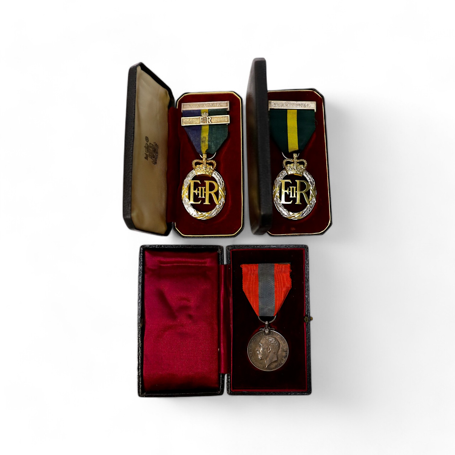 Three assorted service medals; Imperial Service medal to Henry Chillingworth; Territorial Efficiency Decoration 1964; T&A.V.R Efficiency Decoration 1970. All cased. Condition - good.